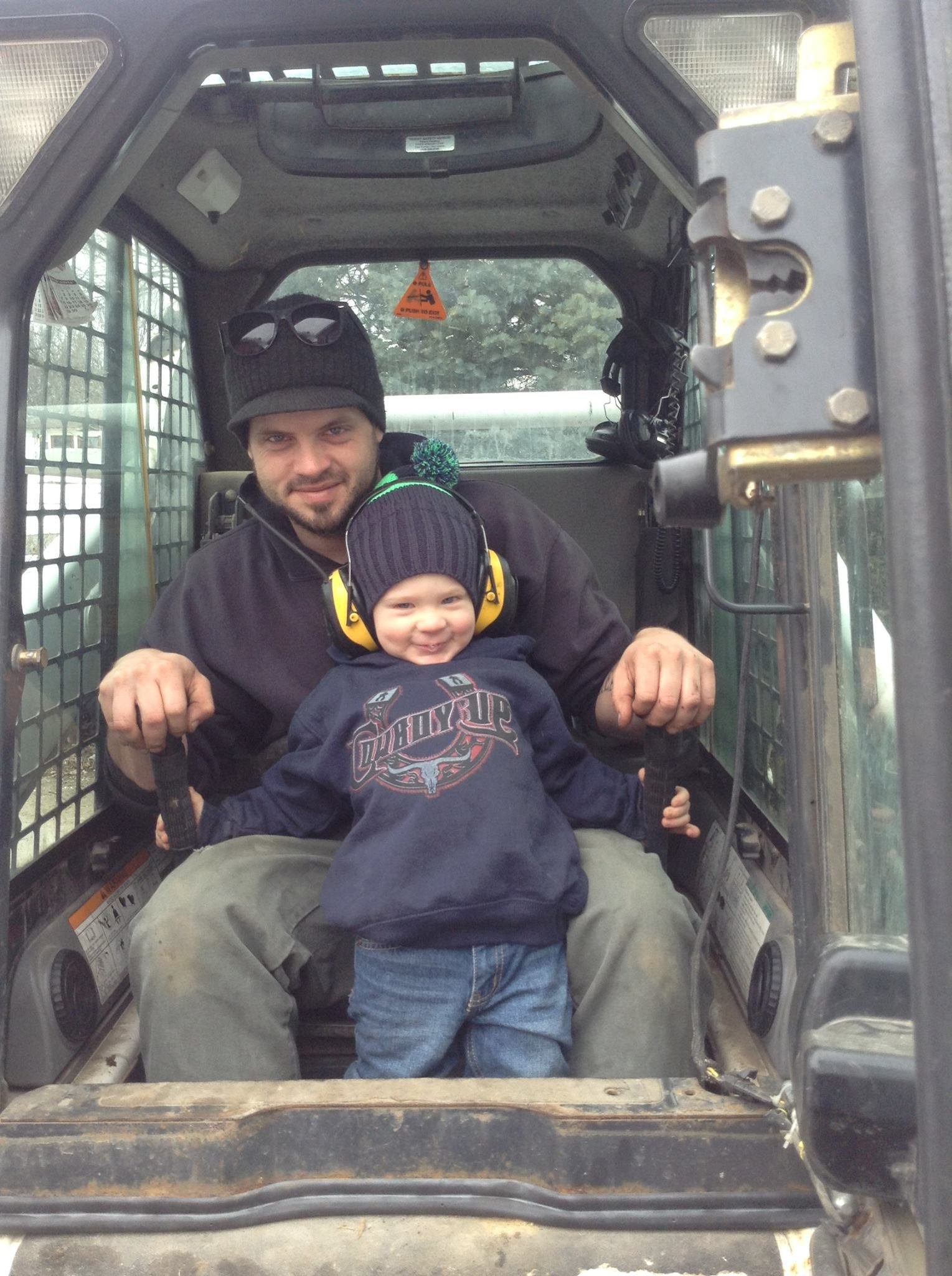 John Schwinger and his son -- Schwinger Lawn Service, Stuart Iowa