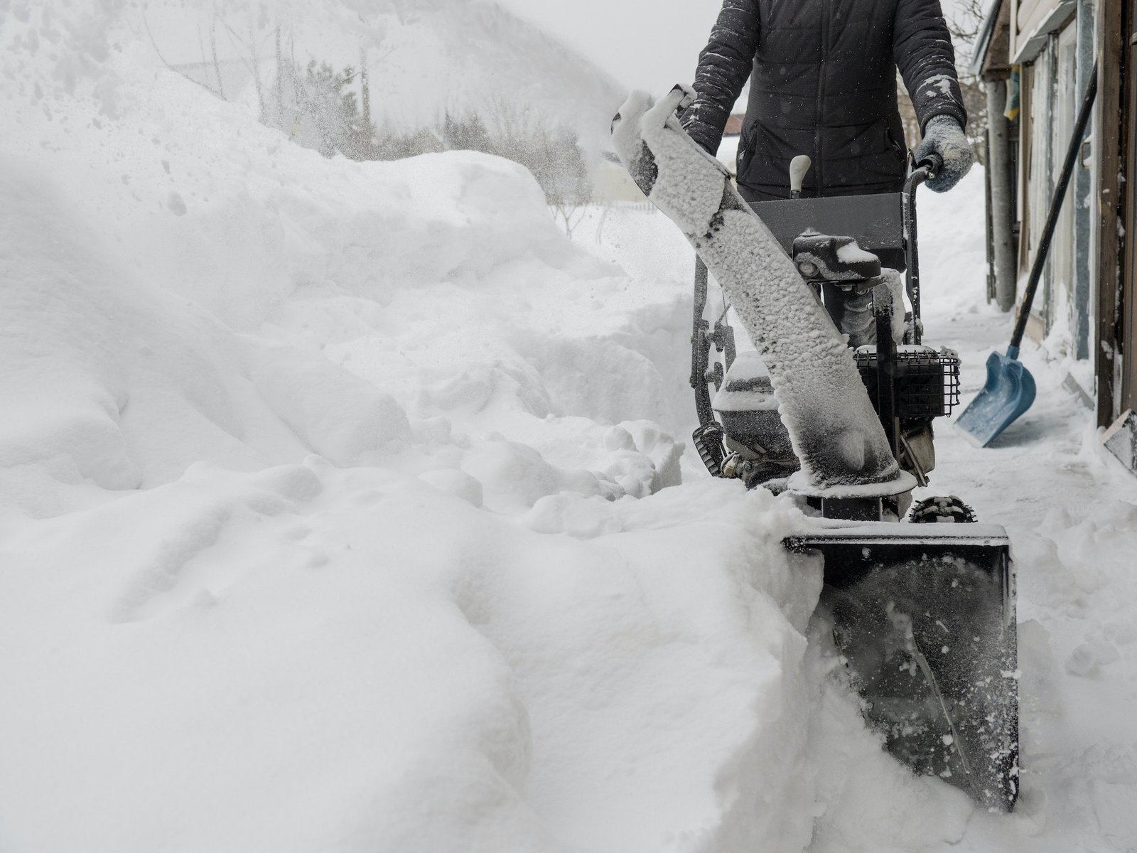 Snow removal in Stuart, Iowa -- snowblower clearing driveway