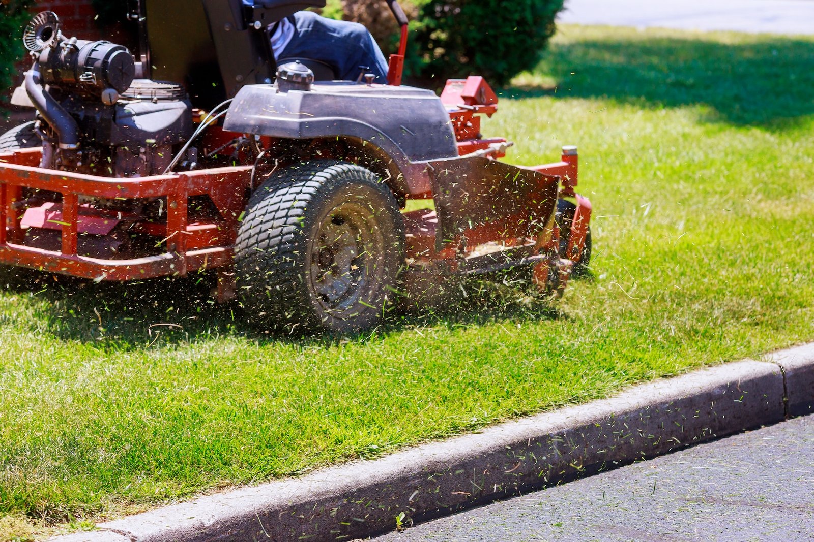 Zero-turn mower cutting grass in Stuart, Iowa